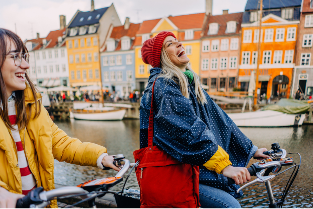 Happy woman riding on a bike