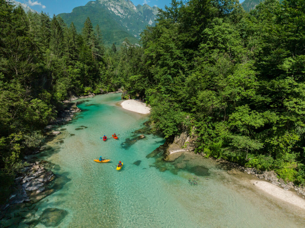 Aerial view of kayakers on wild river