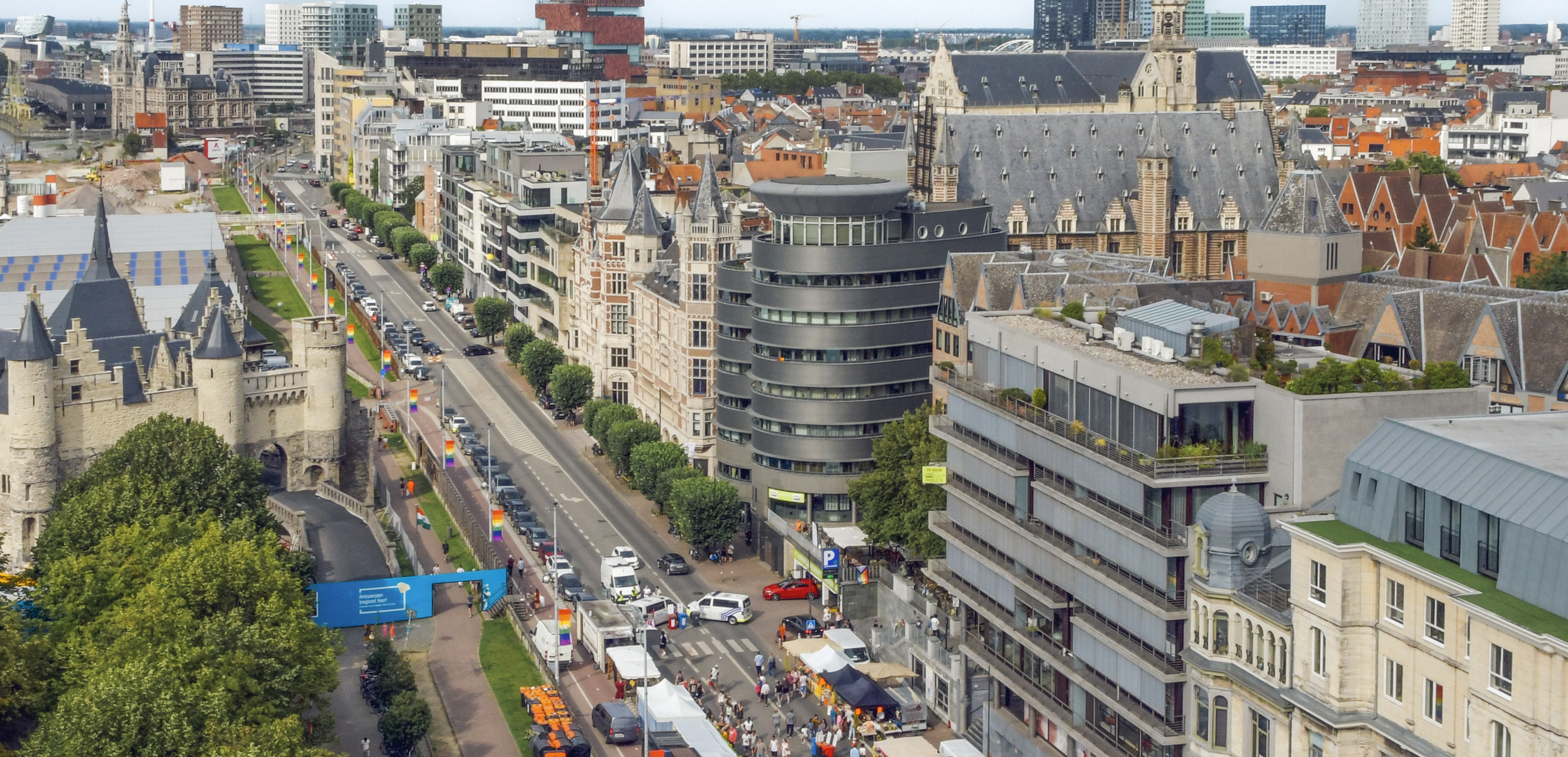 Panorama of Antwerp waterfront street during summer events and walks