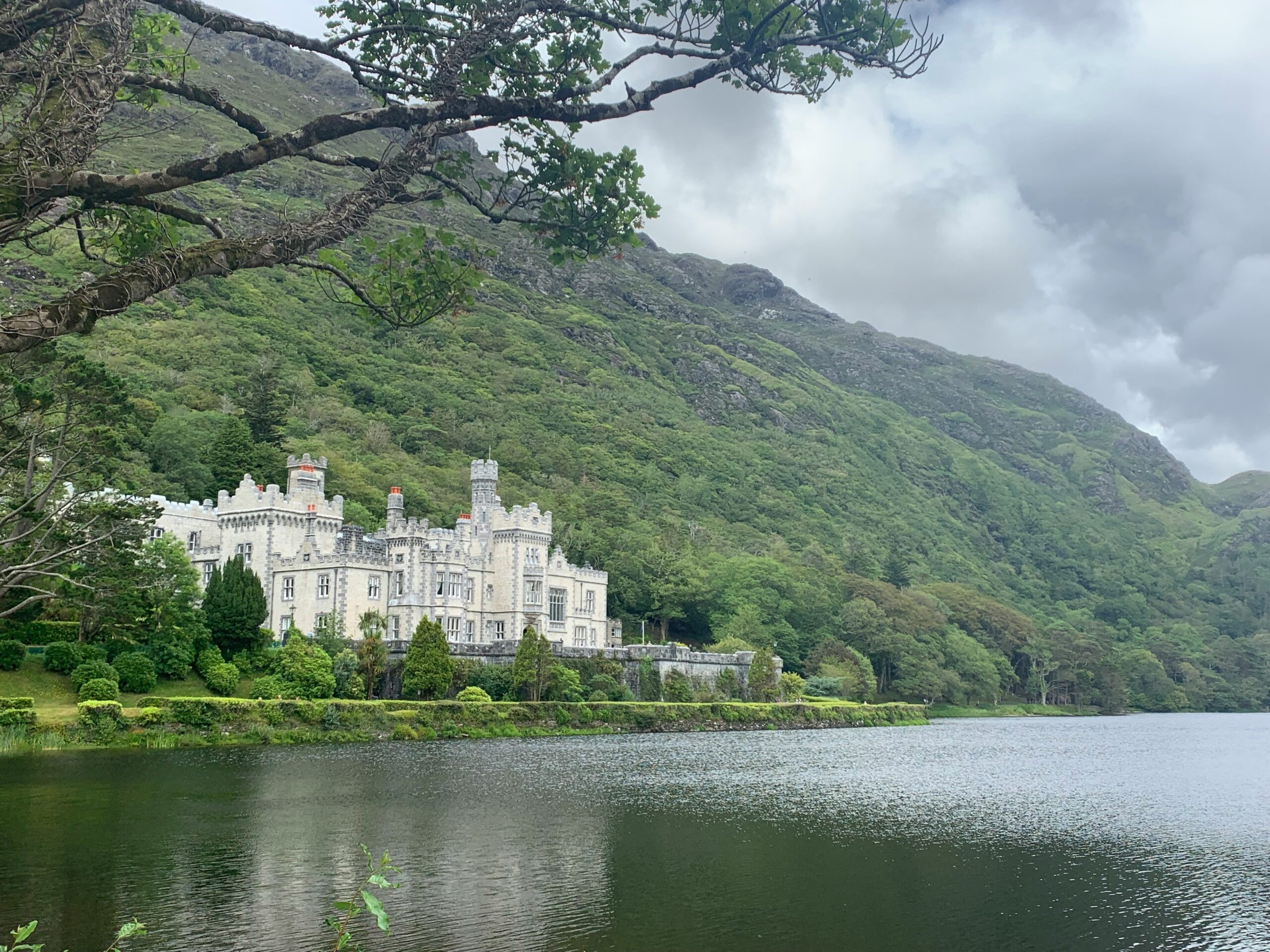 View of a historical castle in Ireland next to a lake