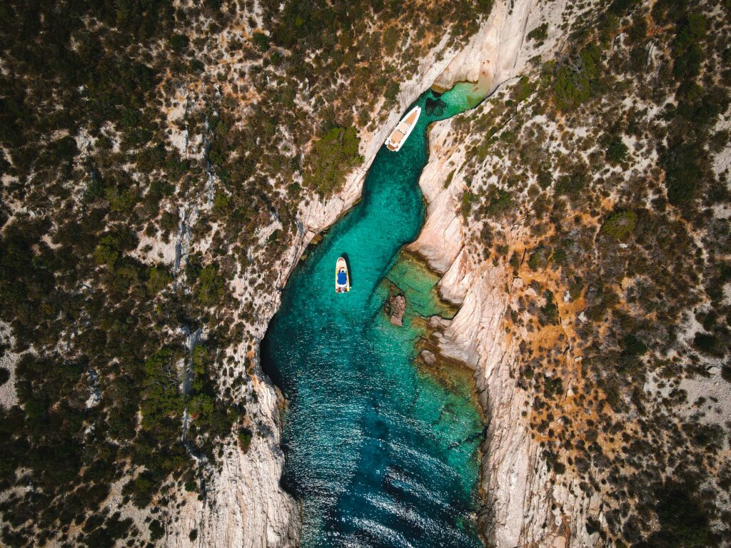 Overhead view of boats in clear blue water
