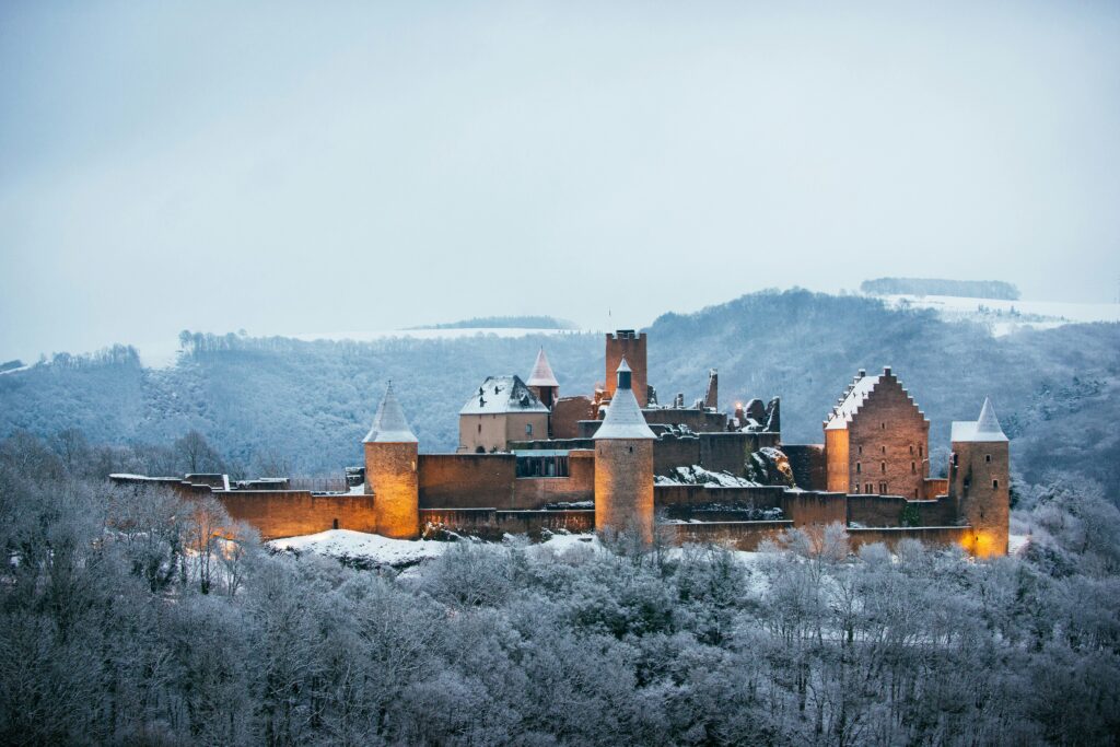 Historical castle in Luxembourg covered in snow